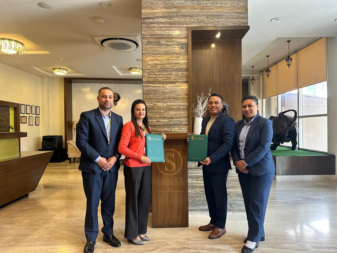 कामना सेवा विकास बैंक र होटल सब्रिनाबीच सेवा शुल्क छुटसम्बन्धी सम्झौता